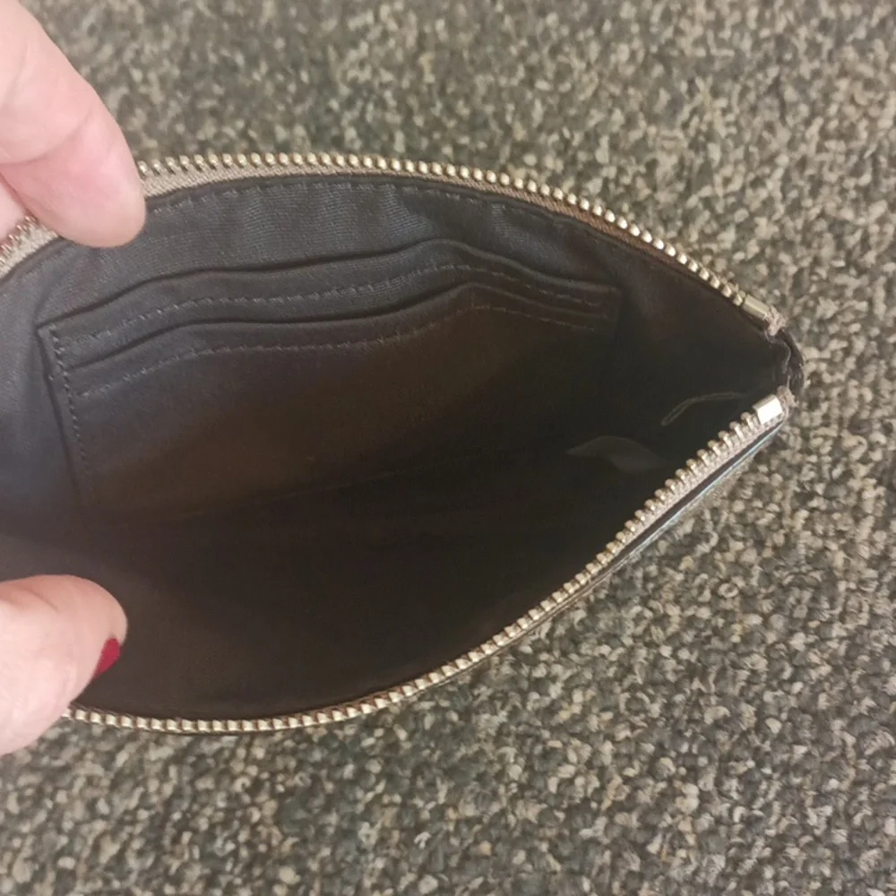 Coach vintage gold metallic shiny pebble grain leather wristlet